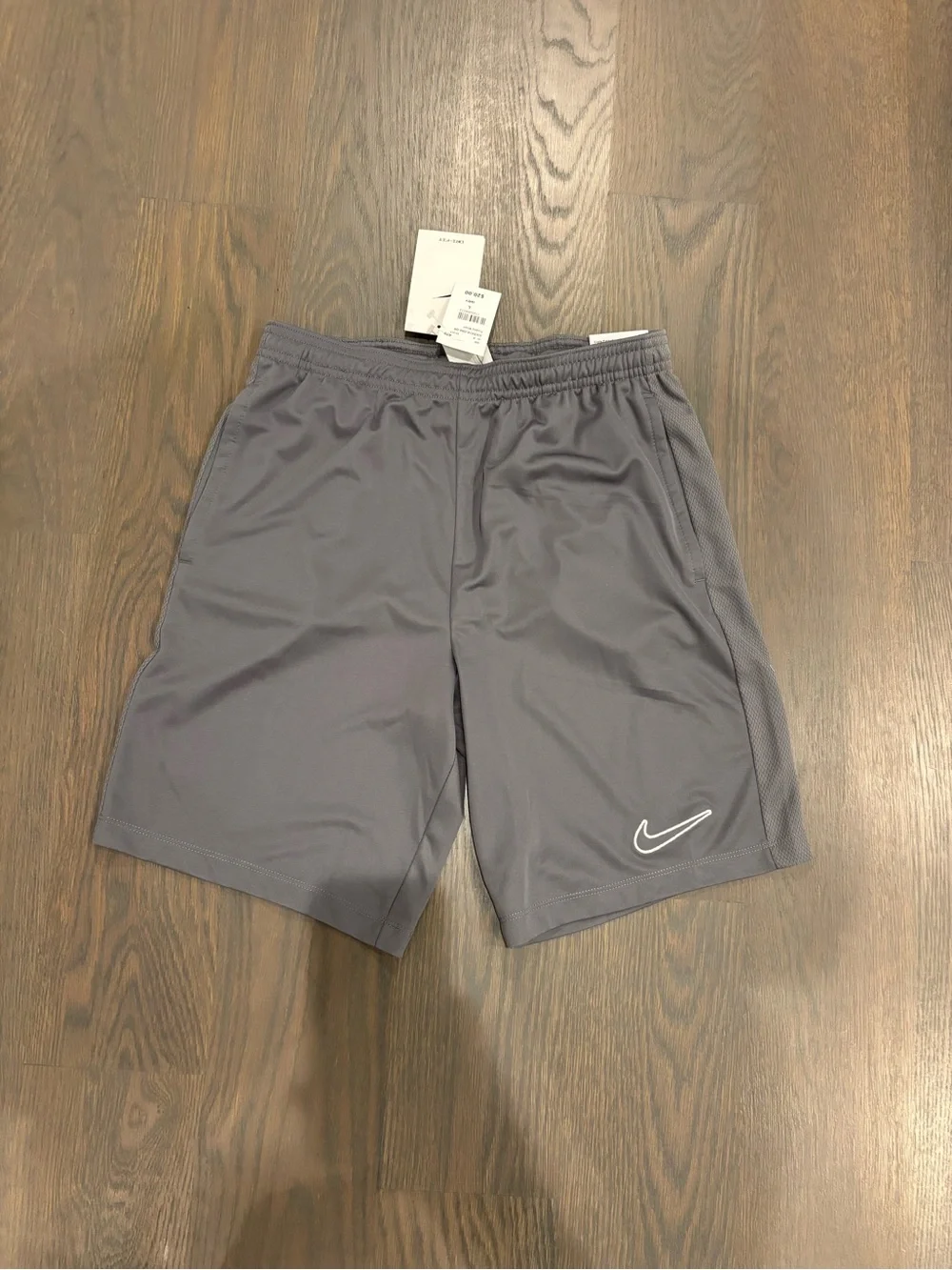 Nike Boys’ Gray Athletic Shorts with White Swoosh
